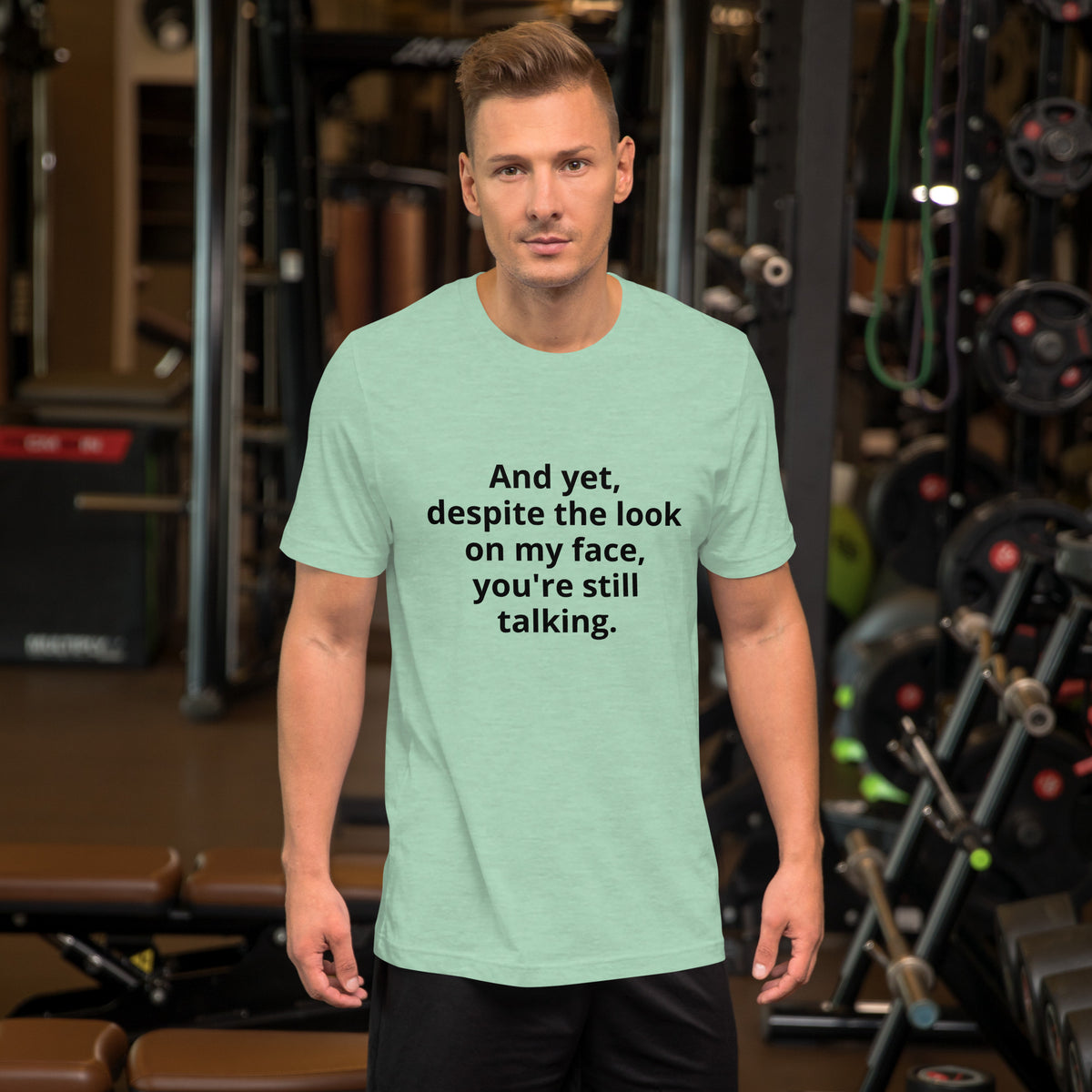 "And yet, despite the look on my face, you're still talking." - T-shirt, unisex (DT)