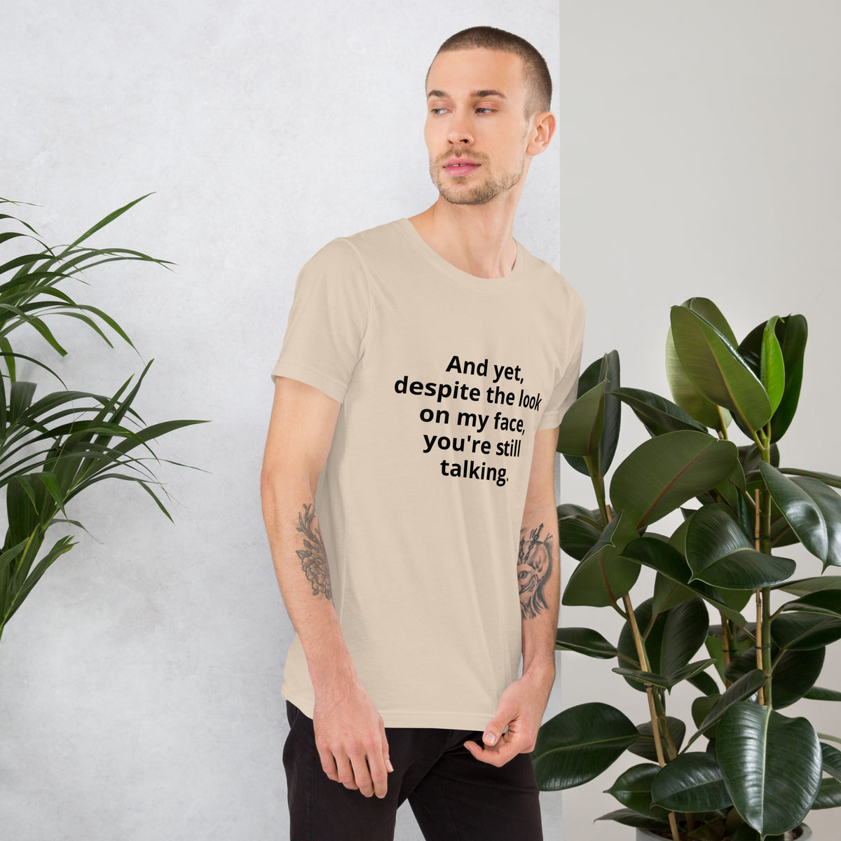 "And yet, despite the look on my face, you're still talking." - T-shirt, unisex (DT)